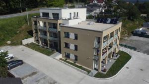 an overhead view of a building with a parking lot at Apartmány Starý Blich in Bardejov