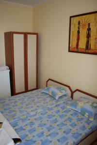 Postel nebo postele na pokoji v ubytování Homestay Kostadinov