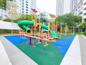 a playground with a slide in a park at IdamanKu Comfort Studio - Cybersquare SOHO Cyberjaya in Cyberjaya
