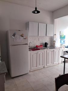 Kuchyň nebo kuchyňský kout v ubytování Aleli