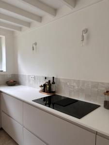 Køkken eller tekøkken på La maison du Lavoir