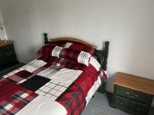 Postel nebo postele na pokoji v ubytování Grand Logement Chaleureux