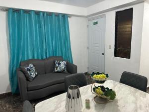 Χώρος καθιστικού στο apartamentos y villas samantha
