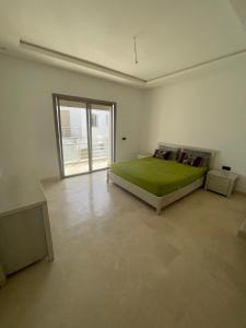 Postel nebo postele na pokoji v ubytování Trés Belle villa sur un belle endroit