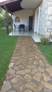 a stone walkway in front of a house at Plaja 10 dk , Bahçeli, Huzurlu Tatil Evi in Datca +9 photos