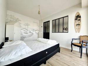 Postel nebo postele na pokoji v ubytování Appartement sur Port - 78m2 Balcon
