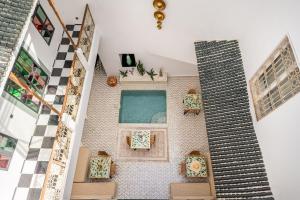 an overhead view of a house with a swimming pool at Riad LILIA in Marrakech +39 photos