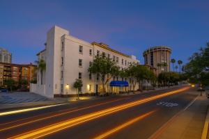 a city street at night with a building at Motel 6-San Diego, CA - Downtown in San Diego