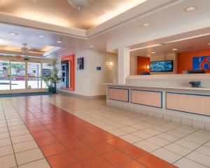 a lobby of a fast food restaurant with a counter at Motel 6-San Diego, CA - Downtown in San Diego