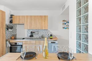 Kuchyň nebo kuchyňský kout v ubytování Le Nid Bleu - 3 stars - Modernity & Quiet Place + 10 fotografií