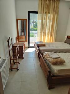 Postel nebo postele na pokoji v ubytování appartement vue mer monastir