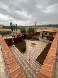 a view of a patio from the roof of a house at Gite taymate in Zaouia Ben Smine +11 photos