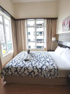 Giường trong phòng chung tại Seri Bukit Ceylon Bukit Bintang +26 ảnh