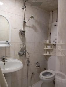 Koupelna v ubytování Khan Apartment
