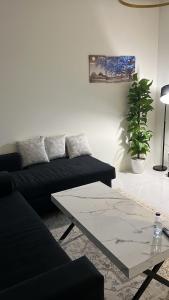 Et opholdsområde på Apartment Room Lounge & Bathroom