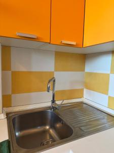 Η κουζίνα ή μικρή κουζίνα στο Mansarda accogliente in ottima posizione +18 φωτογραφίες