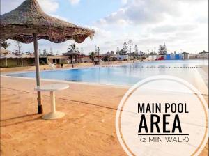 a view of the main pool area at a resort at Coastal Escape - Ballah Resort in Al Ḩammām