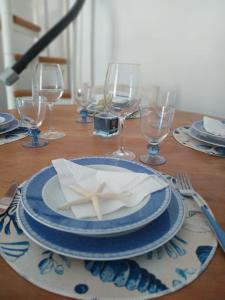 a table with a plate with a starfish on it at La Maga Circe in San Felice Circeo