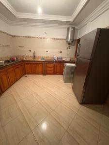 Kuchyň nebo kuchyňský kout v ubytování Bel appartement en plein Taza