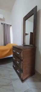 Ένα ή περισσότερα κρεβάτια σε δωμάτιο στο El hotel más céntrico de Cd Valles con estacion de autobuses a media cuadra que te llevara a toda la huasteca