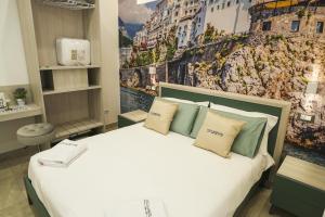 Кровать или кровати в номере Villa Angelina