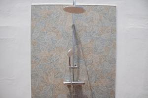 a sliding glass door with a design on a wall at La Gaviota in Puerto de la Cruz +26 photos