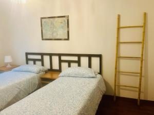 Postel nebo postele na pokoji v ubytování Selene Apartment 20 minutes by train from Venice