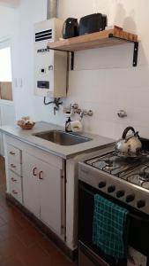 Nhà bếp/bếp nhỏ tại Dpto Familiar 2 Dorm con balcón, vista al Puerto - Centro Santa Fe