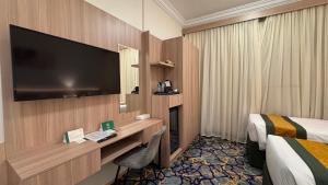 Gambar di galeri bagi فندق نيوليفيل - New Level Hotel di Al Masfalah