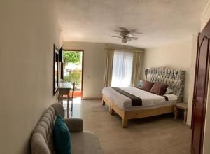 Ένα ή περισσότερα κρεβάτια σε δωμάτιο στο Hotel Real de San Diego