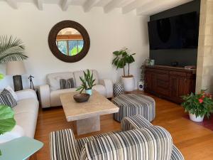a living room with a couch and a table at Forty9 Steps in Russell