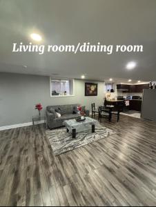 a living room with a couch and a living room dining room at Fully Furnished 2 Bedroom Apartment in Kitchener