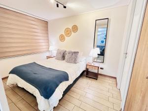 Ένα ή περισσότερα κρεβάτια σε δωμάτιο στο Departamento 1D-1B hasta 4 personas, Parking, AC, Calefaccion