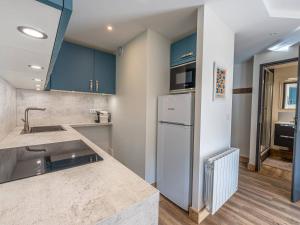 Kuchyň nebo kuchyňský kout v ubytování Bel appartement rénové à Plagne Bellecôte pour 7 personnes, proche télécabine - FR-1-351-270 + 18 fotografií