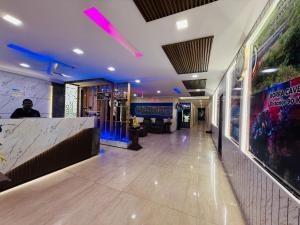 a lobby of a restaurant with a bar in it at hotel KGB Legend Grand in Visakhapatnam