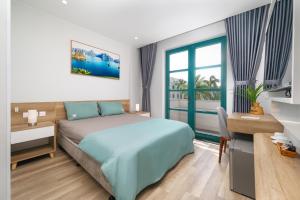 Postel nebo postele na pokoji v ubytování Sunna Hotel