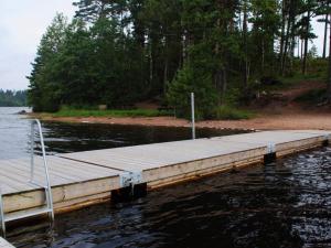 a dock in the middle of a body of water at 4 person holiday home in HÅCKSVIK-By Traum in Håcksvik +10 photos