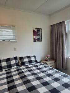 Postel nebo postele na pokoji v ubytování Art Deco on Morse