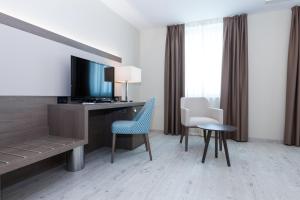 TV a/nebo společenská místnost v ubytování Hotel Petrčane