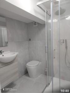 Koupelna v ubytování Alloggio turistico La Taverna