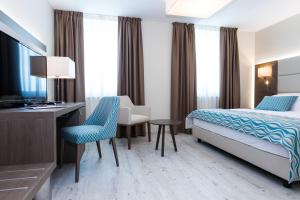 Postel nebo postele na pokoji v ubytování Hotel Petrčane