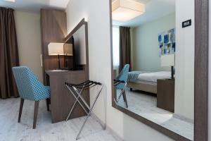 Postel nebo postele na pokoji v ubytování Hotel Petrčane