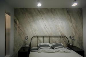 Ένα ή περισσότερα κρεβάτια σε δωμάτιο στο Apartament Duo Style