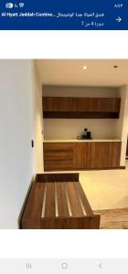 a website screenshot of a kitchen with a counter at بيتوتات التيسير in Jeddah