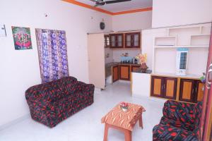 Kuchyň nebo kuchyňský kout v ubytování Bhudeve Stay Home + 16 fotografií