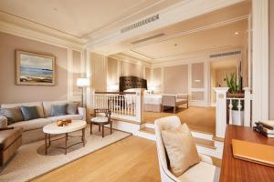 Posezení v ubytování Donghai Xianhucheng Huanglong Hotel