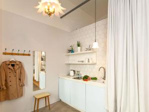 Kuchyň nebo kuchyňský kout v ubytování grätzlhotel Karmelitermarkt