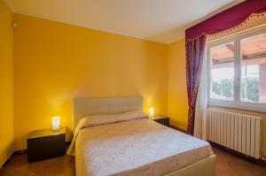 Letto o letti in una camera di Borgo Dragani