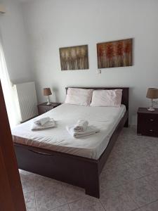 Postel nebo postele na pokoji v ubytování JULIS House