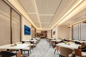 TV a/nebo společenská místnost v ubytování Atour Hotel Yiwu's Heart Xiuhu Park